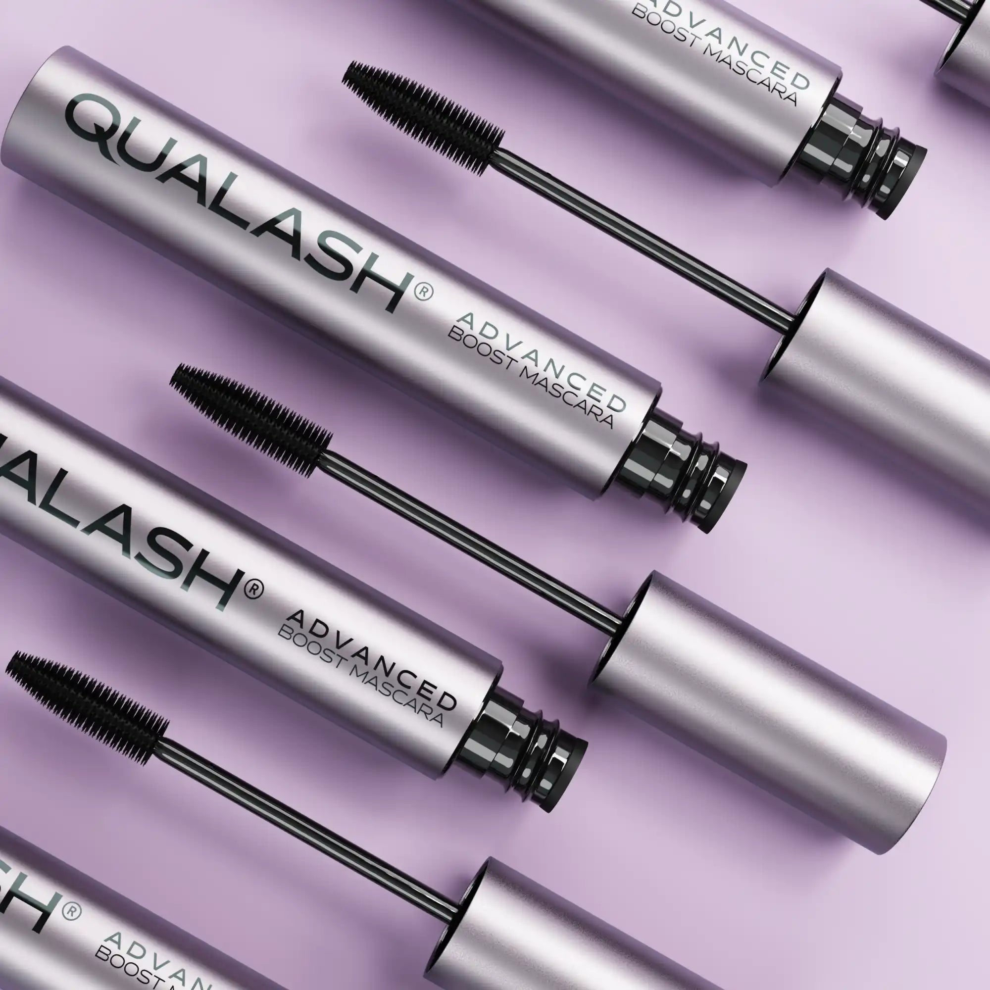 Silver mascara tubes with black wands.